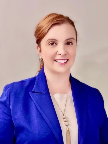 A person in a blue jacket

    Description automatically generated